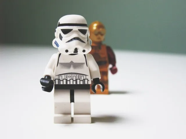 Lego Star Wars C3-P0 behind Stormtrooper toys